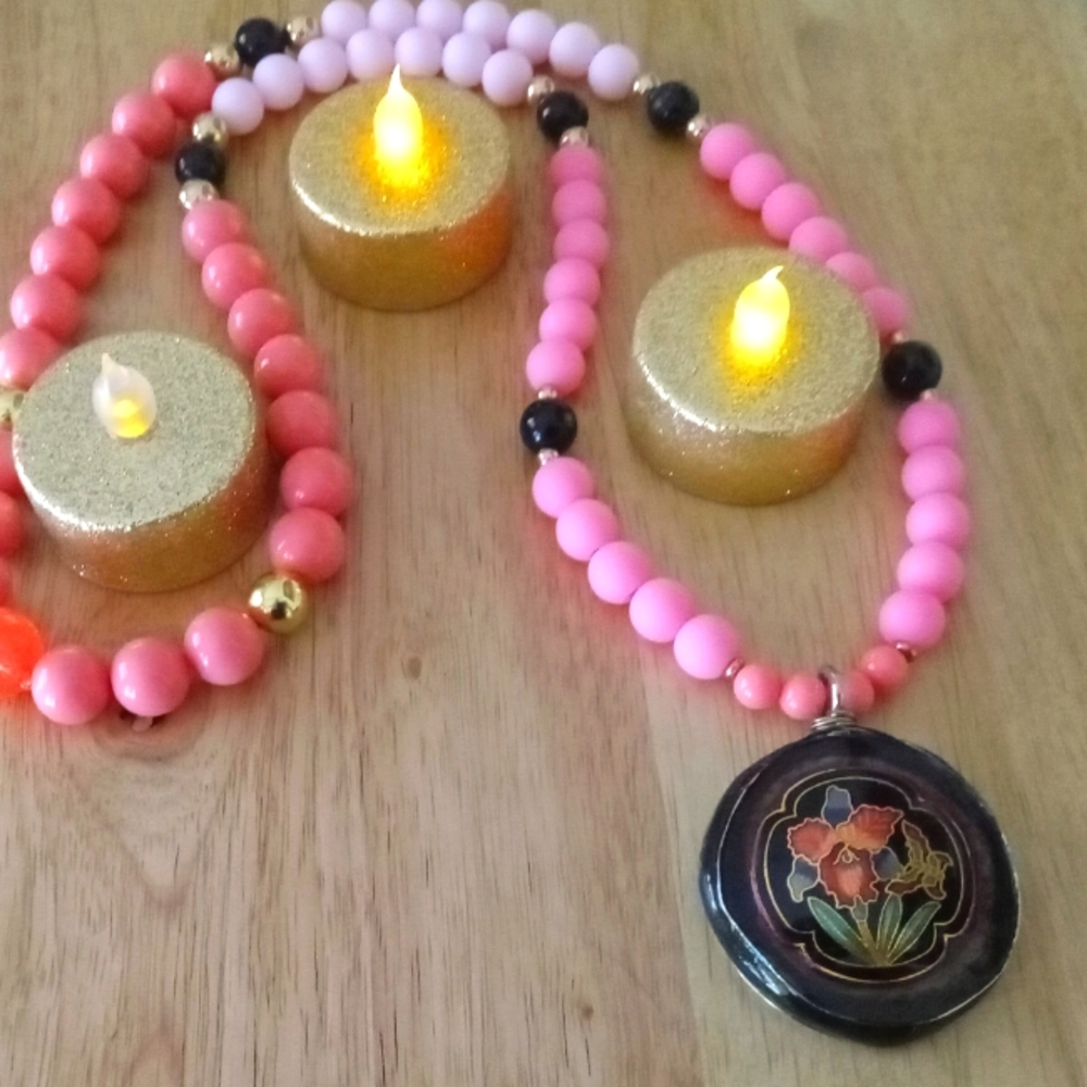 Flower emblem necklace